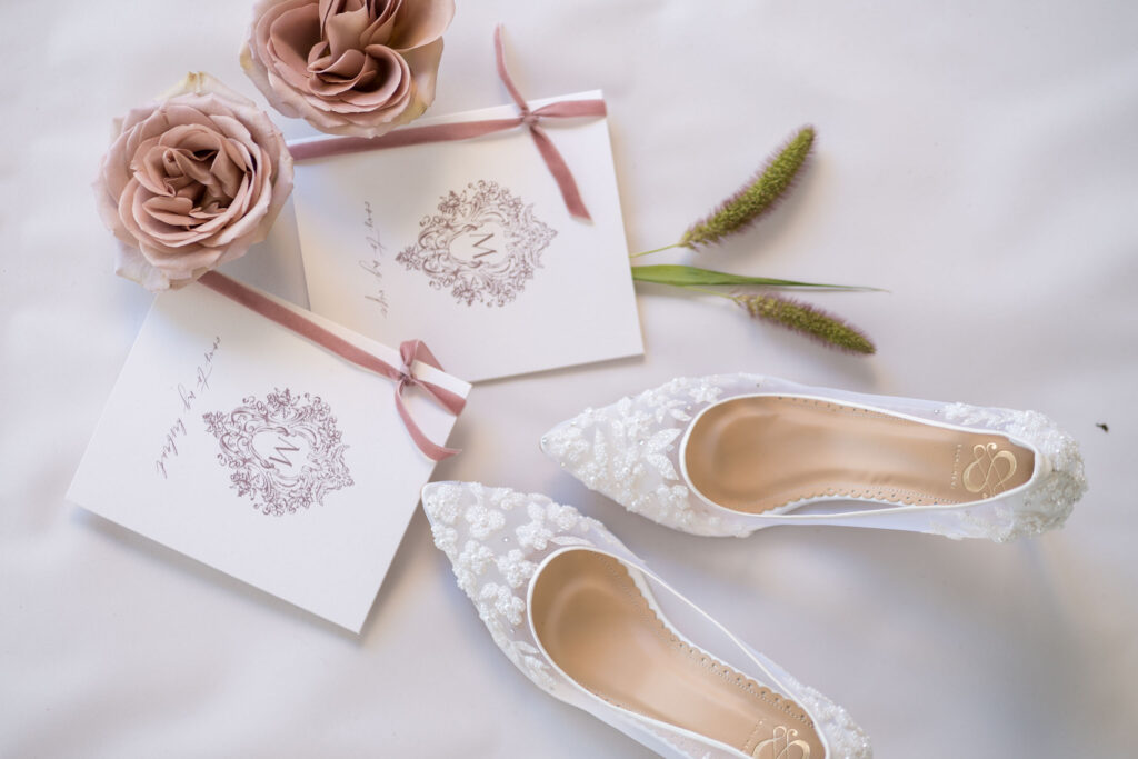 pink flat lay by Lake of the Ozarks wedding photographer The Bennetts