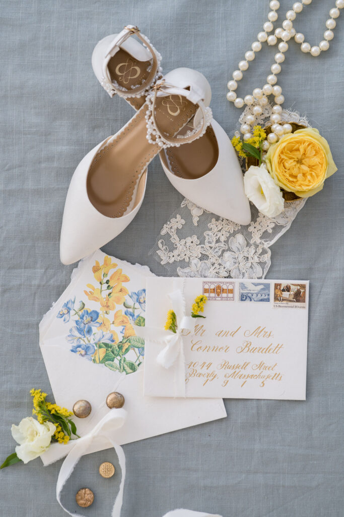 blue and yellow flat lay by Lake of the Ozarks wedding photographer The Bennetts