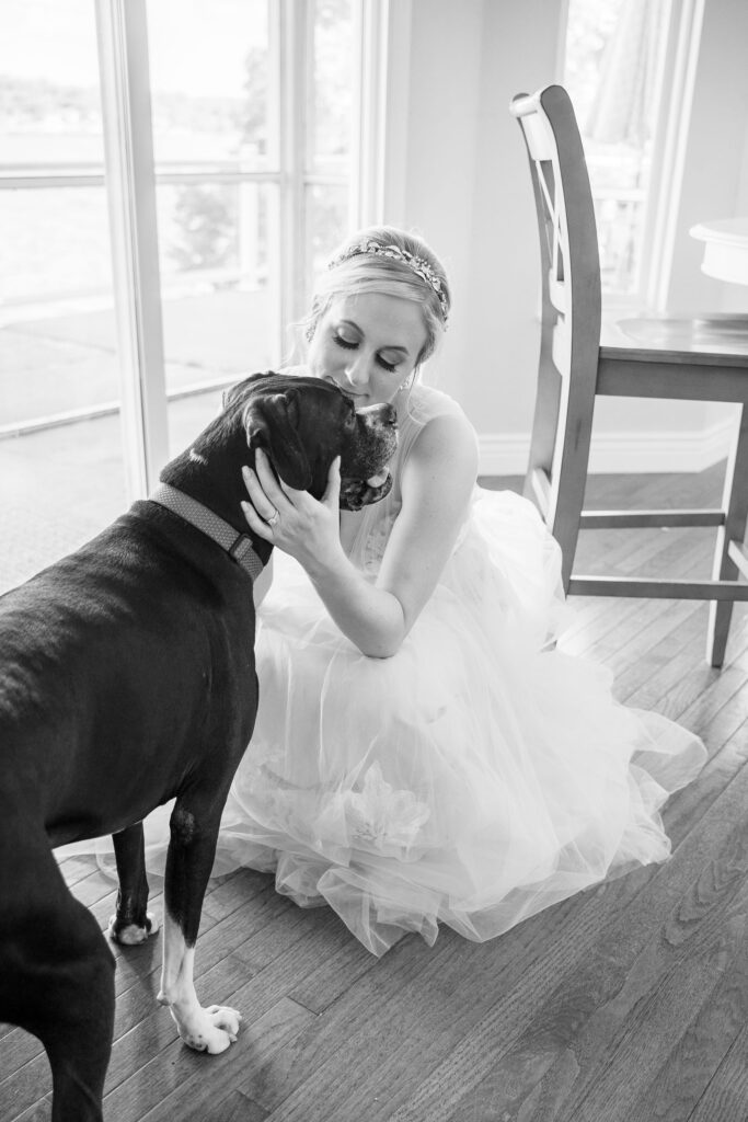 bride and dog bride at Chateau Bouffemonte by Lake of the Ozarks wedding photographer The Bennetts