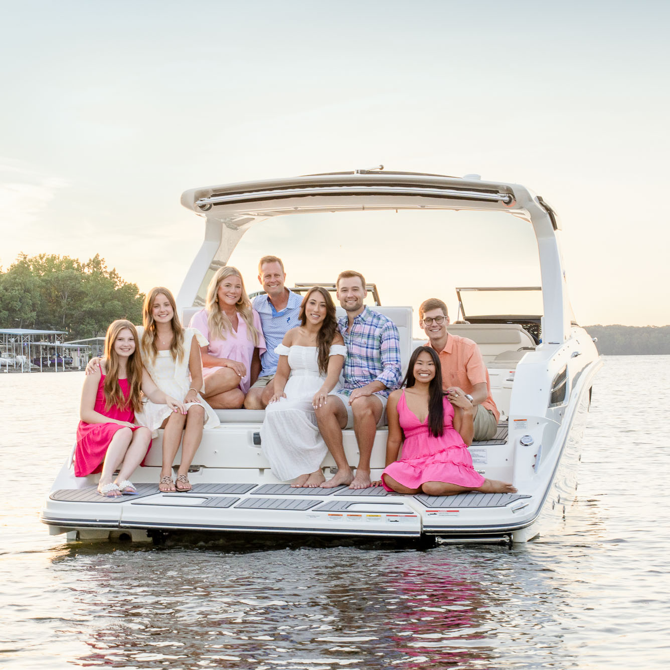family portrait on a boat by Lake of the Ozarks photographer The Bennetts