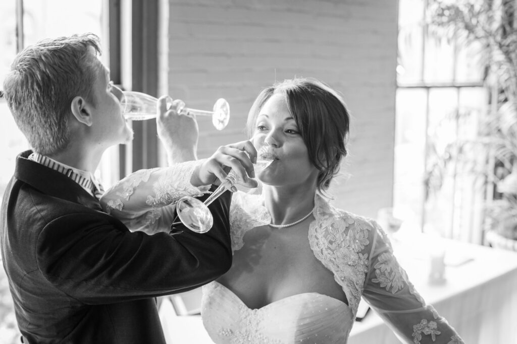 a champagne toast by Lake of the Ozarks wedding photographer The Bennetts